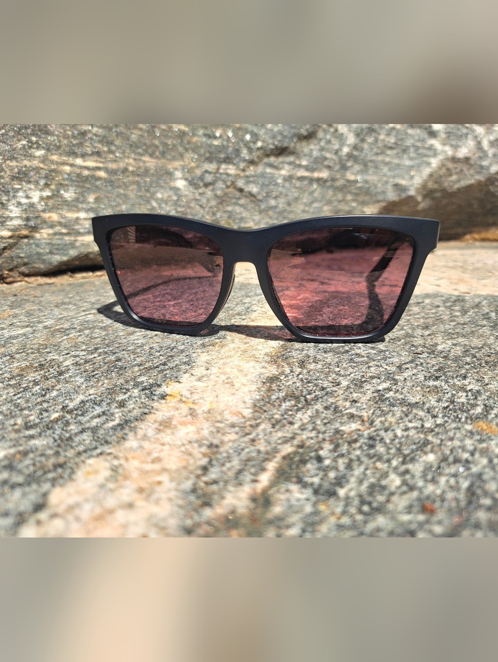 Classic Black Frame Sunglasses with Pink-Tinted Lenses
